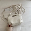 Cream white large capacity tote bag with integrated handles and adjustable strap - White