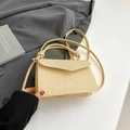 Chic beige woven striped crossbody bag with handle and knot detail in elegant setting - Khaki