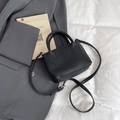 Mini black lychee pattern leather bucket bag with dual handles and shoulder strap - Black without Pendant