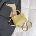 Mini light yellow lychee pattern leather bucket bag with top handle and crossbody strap - Yellow Without Pendant