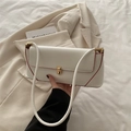 Chic white baguette shoulder bag with red edge paint and gold metal buckle - White
