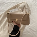 Minimalist oatmeal baguette shoulder bag with gold clasp and elegant thin strap - Khaki
