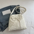 Creamy white nylon tote bag featuring a cute bow decoration and wide shoulder strap - Off White