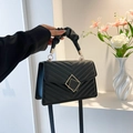 Elegant black quilted handbag with golden lock and scrunchie handle for fashion women - Black