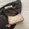 Retro underarm bag with cherry print and khaki leather straps on a grey blazer - Khaki