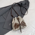 Secchiello in tela beige e pelle marrone scuro con coulisse e dettaglio a fiocco - Grigio chiaro