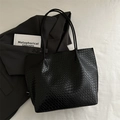 Minimalist black hand-woven tote bag with large capacity and sleek leather texture - Black