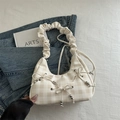 Chic cream checkered shoulder bag with bow detail and trendy ruffled cloud strap - Khaki