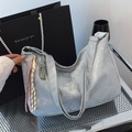 Vintage silver grey hobo tote bag with metallic texture and woven pendant on metal stool - With Pendant / Silver