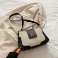Borsa a spalla minimalista beige in tessuto con finiture in pelle nera e fiocco d'oro - Bianco e Nero