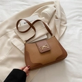 Borsa a tracolla marrone vintage con texture intrecciata e fibbia a fiocco dorata - Marrone