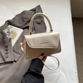 Bolso bandolera beige elegante con costuras de cuero y detalles de tejido fino - Blanco Roto