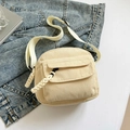 Cream corduroy crossbody bag with front flap pocket and adjustable woven shoulder strap - Off White