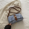 Light blue minimalist underarm bag with brown leather strap and gold buckle accent - Blue