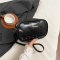 Sleek black faux leather crossbody bag with rivet studs and a metal plaque detail - Black
