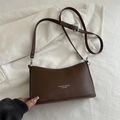 Dark brown leather shoulder bag with adjustable strap and fashion logo print - Brown
