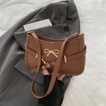 Brown retro shoulder bag with golden bow buckle and smooth faux leather finish - Brown