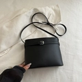 Minimalist black lychee pattern bucket bag with adjustable strap and silver buckle - Black