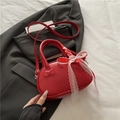 Elegant red shell-shaped crossbody bag with heart texture and lace ribbon detail - Red With Silk Scarf