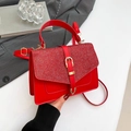 Red glitter and leather handbag with gold buckle, featuring a top handle and strap - Sequin Patchwork Style / Red
