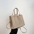 Structured beige square handbag with top handle and detachable crossbody strap - Khaki