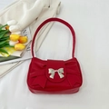 Red bow shoulder bag for women made of premium PU leather with silver metal clasp - Red