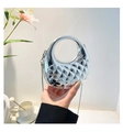 Detail of silver quilted mini bag with metallic bead accents and circular handle - Silver