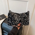 Elegante borsa a spalla in paillettes nere con dettagli argento e manico in pelle - Argento