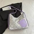 Purple shoulder bag with geometric print and floral embroidery with a front pocket - Purple