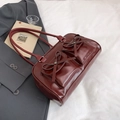 Glossy burgundy bow-tie bowling bag with double front pockets and slim shoulder straps - Red