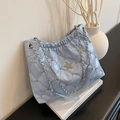 Light blue quilted patent leather tote bag with rhinestone star and silver chain strap - Blue