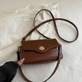 Classic dark brown square crossbody bag with gold ring rotary lock and leather strap - Tan