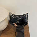 Glossy black patent leather baguette bag with golden chain strap for modern women - Black