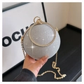 Macro shot of silver sphere evening bag featuring rhinestones and glitter finish - Silver
