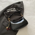 Glossy black patent leather hobo bag with a decorative cherry pendant and chain strap - With Pendant / Black With Pendant