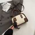 Retro Boston bag in beige and dark brown contrast with black and white woven charm - With Pendant / White & Coffee