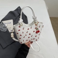 Retro white bucket bag with red cherry print, gold rings and matching cherry charm - With Pendant / Off White