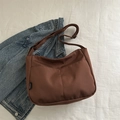 Waterproof dark brown nylon shoulder bag with adjustable strap and front pockets - Brown