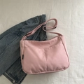 Pink nylon crossbody bag with adjustable wide strap and multi-pocket street style design - Pink