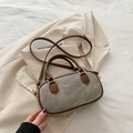 Retro grey denim bowling bag with brown leather trim and adjustable crossbody strap - Gray