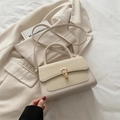 Chic beige crossbody bag with contrast weave texture and gold U-shaped lock closure - Off White