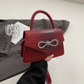 Dark red crocodile embossed handbag with a large sparkling rhinestone bow accent - Red