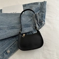 Chic black litchi grain leather shoulder bag with gold zipper and minimalist design - Black