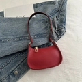Red litchi grain leather hobo shoulder bag with gold zipper and minimalist design - Red