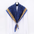 Elegant royal blue paisley silk scarf with gold patterns on a white shirt - 90x90cm / Blue