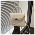 Detail of cream crossbody bag with golden oval twist lock and smooth faux leather finish - White