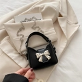 Mini black bow handbag with silver chain strap and matte finish for women - Black
