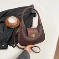 Deep brown woven crescent handbag with golden twist lock and adjustable shoulder strap - Brown
