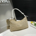 Handwoven straw tote bag with white leather straps and elegant decorative knots - White