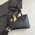 Matte black leather tote bag with decorative scarf accessory for chic office commute style - Black